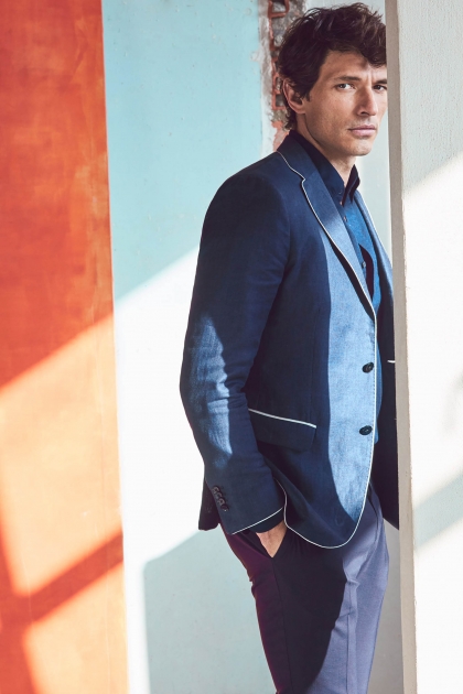 NYC fashion photographer director Hunter and Gatti Massimo Dutti Man blue suite orange backdrop