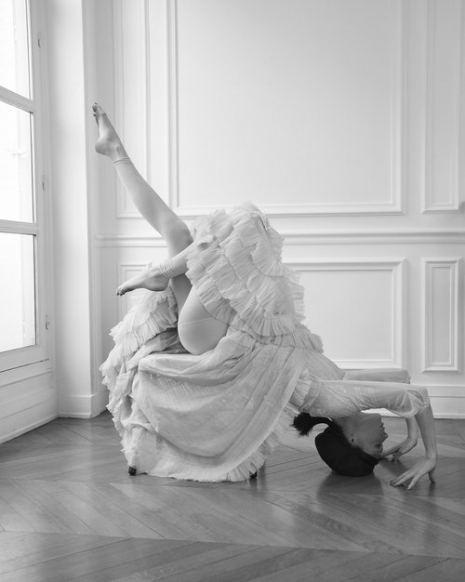Fashion Photographer Director NYC Andreas Ortner Editorial ELLE Magazine CZ Coco Rocha Handstand on Chair Fashion Women