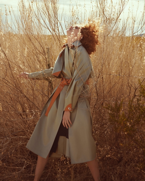 Fashion Photographer Andreas Ortner ELLE Alexina Standing in the Grass Looking up Fashion Women