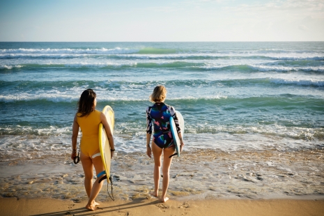 Photographer New York Nina Choi Surfer Girls Walking into Ocean Lifestyle